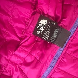 North face reversible jacket.